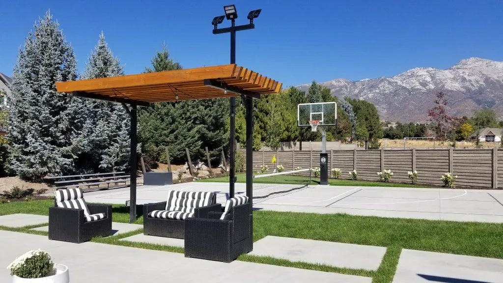 Backyard court and outdoor area with court lights