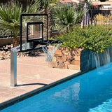 Dominator poolside basketball hoop installed beside a swimming pool