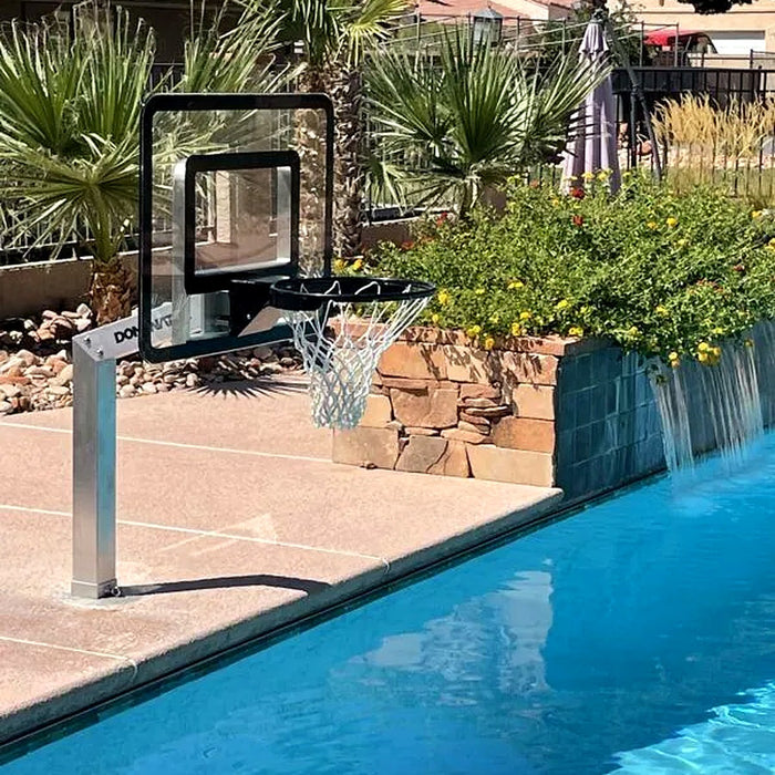 Dominator poolside basketball hoop installed beside a swimming pool